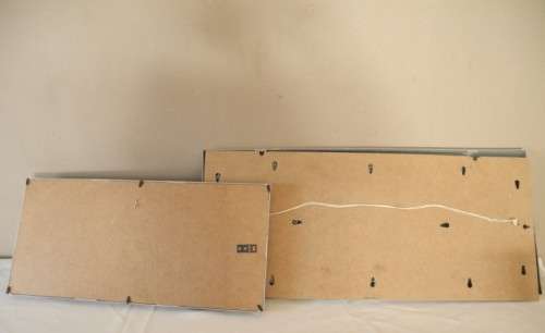 A stunning white and grey plastic wall mounted photo frame for photos. Lifespace Sale