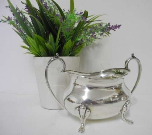 A gorgeous double handled silver plated sugar bowl, stunning on a tea tray, table.