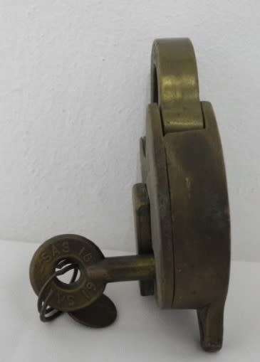 A fantastic vintage SAR/SAS 1976 metal lock and key.