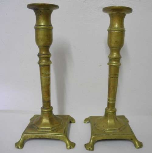 BARGAIN! A wonderful collection of 4 different shapes and sizes brass candle holders