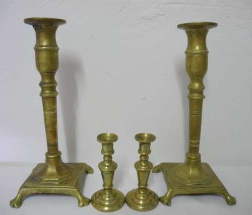 BARGAIN! A wonderful collection of 4 different shapes and sizes brass candle holders