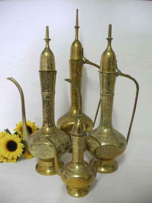 BARGAIN! A stunning collection of different shaped and sizes brass pitchers.