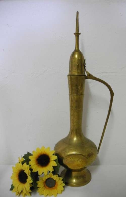 BARGAIN! A stunning collection of different shaped and sizes brass pitchers.