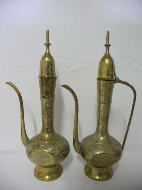 BARGAIN! A stunning collection of different shaped and sizes brass pitchers.