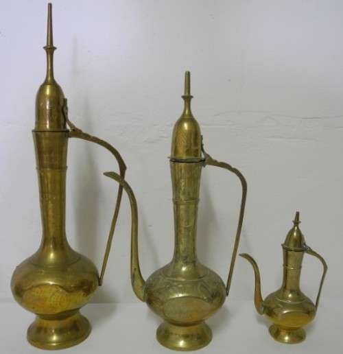 BARGAIN! A stunning collection of different shaped and sizes brass pitchers.