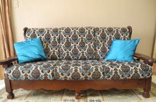A colourful vintage Imbuia 3 seater couch - perfect in a lounge/patio/lapa.