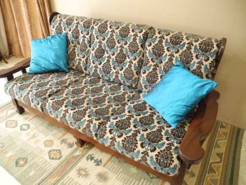 A colourful vintage Imbuia 3 seater couch - perfect in a lounge/patio/lapa.