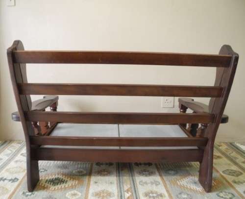 A colourful blue vintage Imbuia 2 seater couch - perfect in a lounge/patio/lapa.