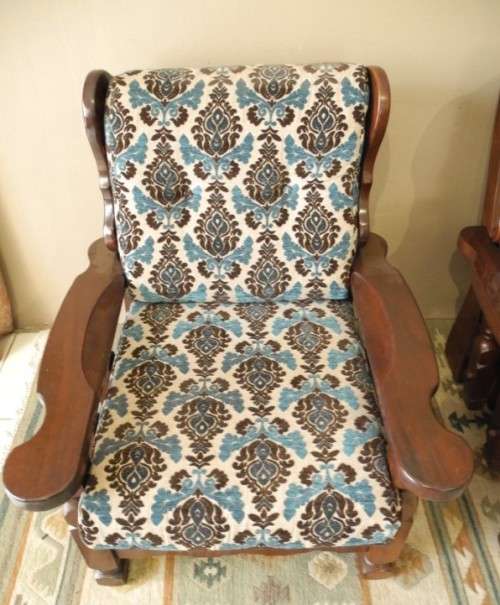 A pair of fabulous floral cushioned vintage Imbuia chairs - perfect in a lapa/patio.