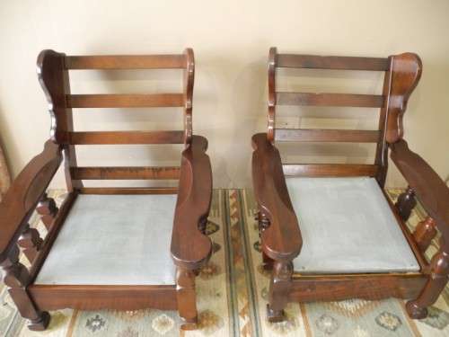 A pair of fabulous floral cushioned vintage Imbuia chairs - perfect in a lapa/patio.
