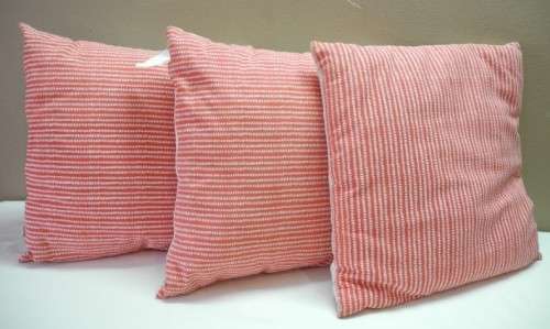 A set of three red and white stylish upmarket, modern scatter cushions. One bid for all.