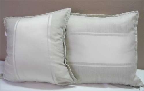 A pair of grey stylish upmarket, modern scatter cushions. One bid for both