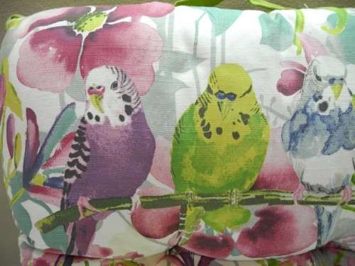 14 stylish upmarket brightly coloured patio chair cushions. Bid/cushion