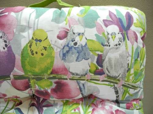 14 stylish upmarket brightly coloured patio chair cushions. Bid/cushion