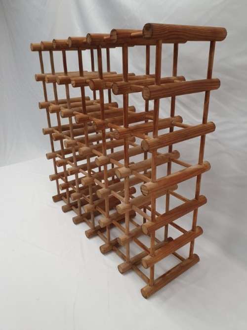 Stylish and practical table-top wooden wine rack with space for 36 wine bottles.