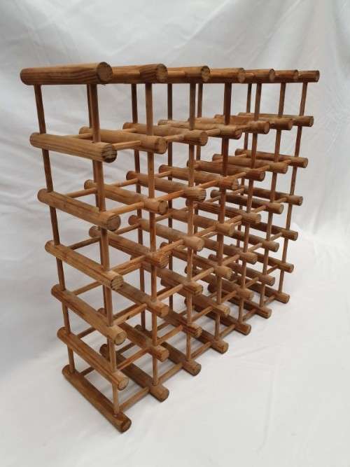 Stylish and practical table-top wooden wine rack with space for 36 wine bottles.