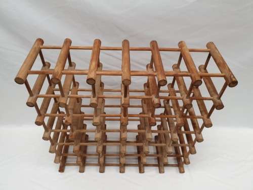 Stylish and practical table-top wooden wine rack with space for 36 wine bottles.