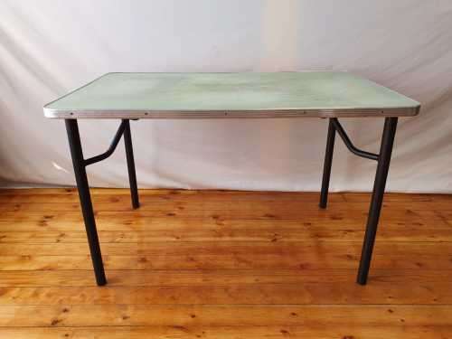 A vintage linoleum six seater table perfect for a garden, patio/ lapa etc