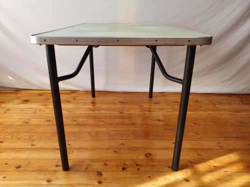 A vintage linoleum six seater table perfect for a garden, patio/ lapa etc