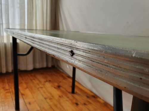 A vintage linoleum six seater table perfect for a garden, patio/ lapa etc