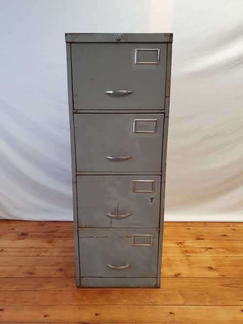 An awesome large 4 drawer metal filing cabinet, needs some tlc, perfect to paint!!