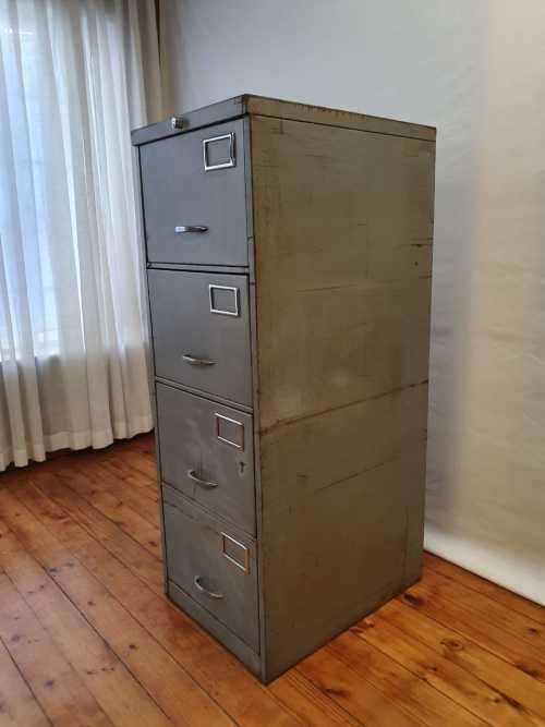 An awesome large 4 drawer metal filing cabinet, needs some tlc, perfect to paint!!