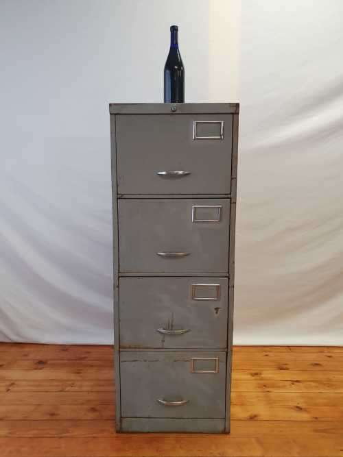 An awesome large 4 drawer metal filing cabinet, needs some tlc, perfect to paint!!