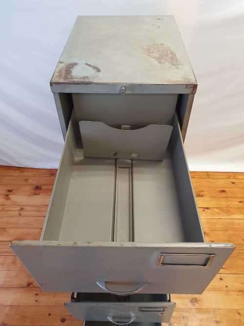 An awesome large 4 drawer metal filing cabinet, needs some tlc, perfect to paint!!