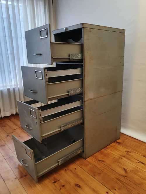 An awesome large 4 drawer metal filing cabinet, needs some tlc, perfect to paint!!