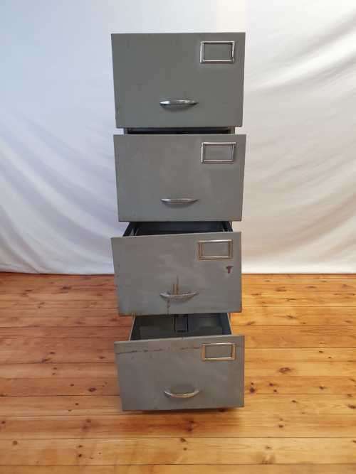 An awesome large 4 drawer metal filing cabinet, needs some tlc, perfect to paint!!
