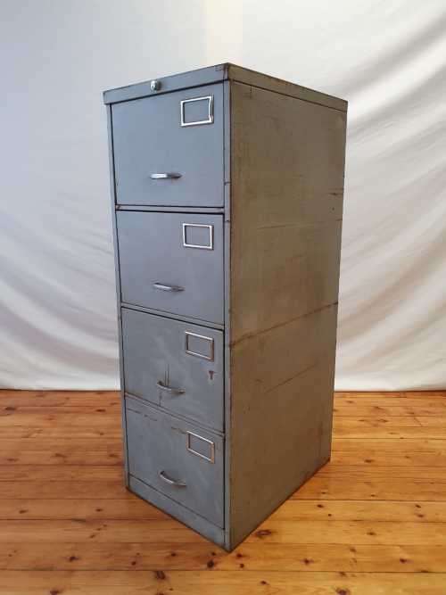 An awesome large 4 drawer metal filing cabinet, needs some tlc, perfect to paint!!