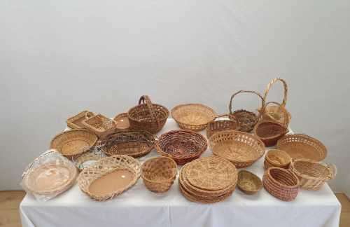 An assortment of table/ flower/ bread baskets, paper plate holders