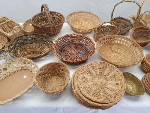 An assortment of table/ flower/ bread baskets, paper plate holders