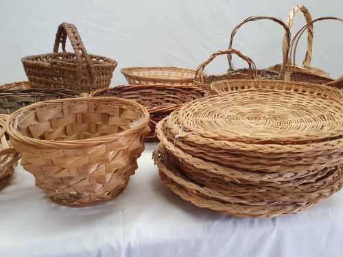 An assortment of table/ flower/ bread baskets, paper plate holders