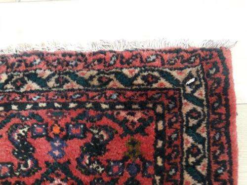 A stylish Hossenabad Persian runner carpet (80cm x 397cm).