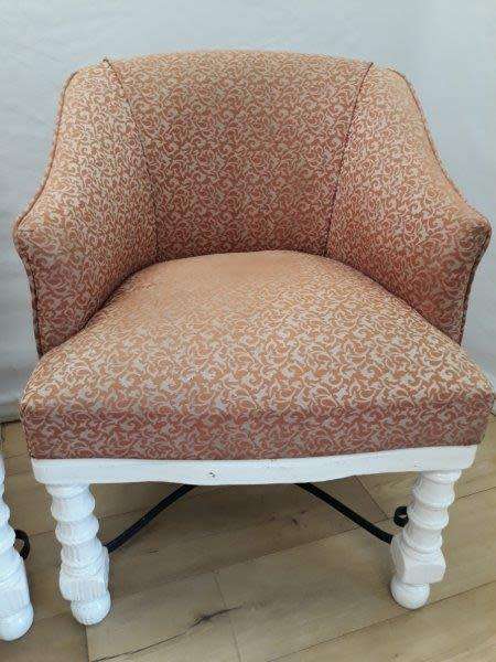 A stunning white wood base arm chair for restoration