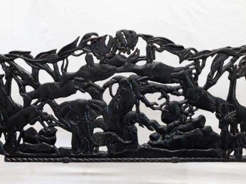 A cast iron slatted wood all weather garden/ patio bench.