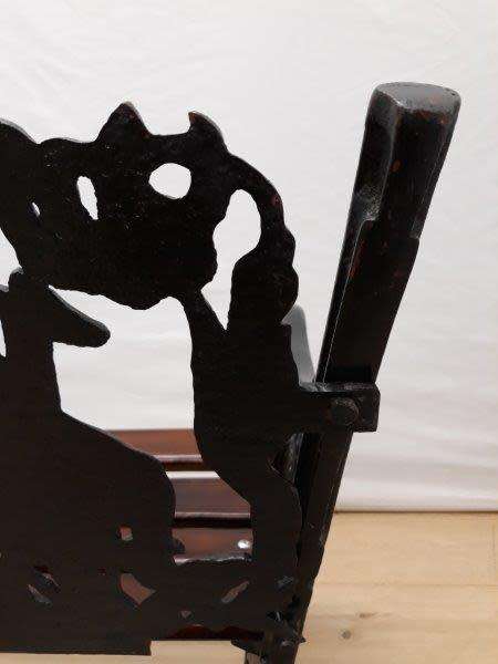 A cast iron slatted wood all weather garden/ patio bench.