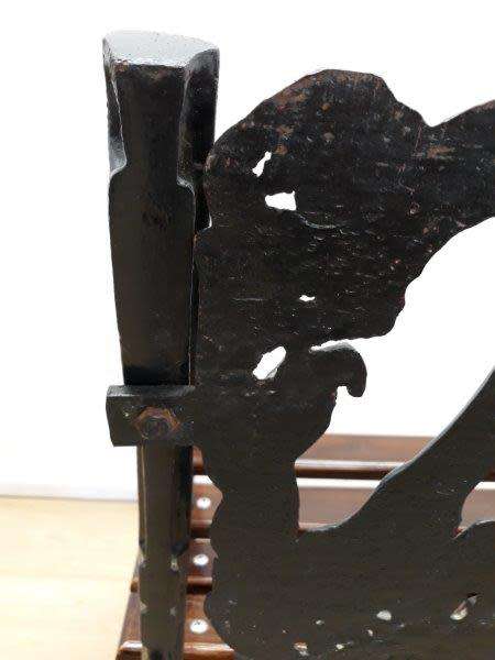 A cast iron slatted wood all weather garden/ patio bench.