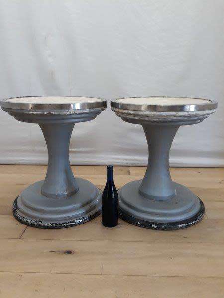 A set of two Marble top round occasional tables