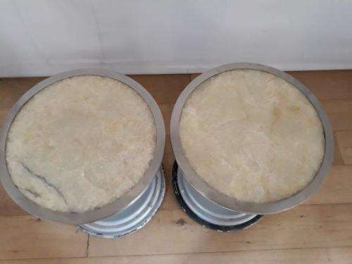 A set of two Marble top round occasional tables