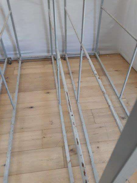 3 industrial size metal clothes hanging rails on wheels