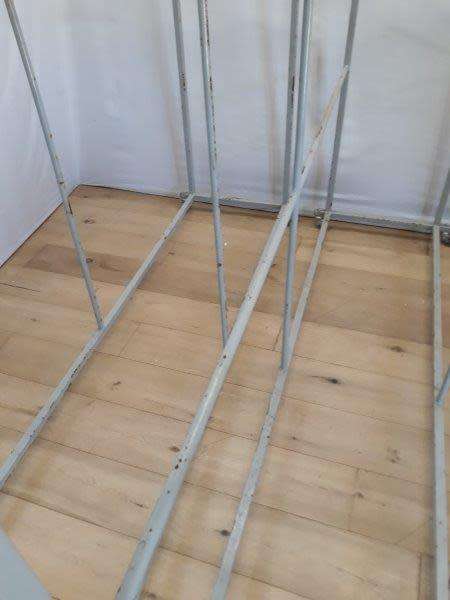 3 industrial size metal clothes hanging rails on wheels