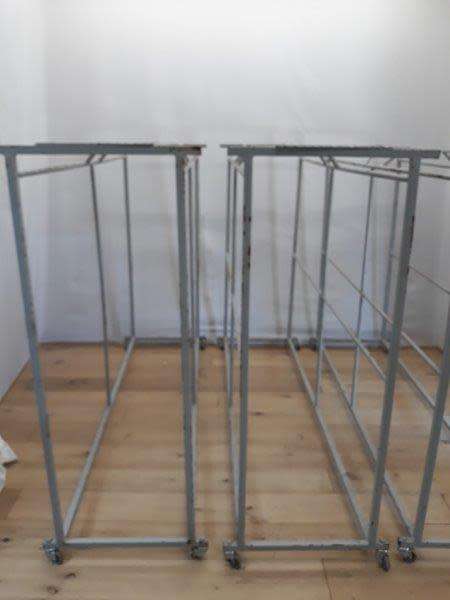 3 industrial size metal clothes hanging rails on wheels