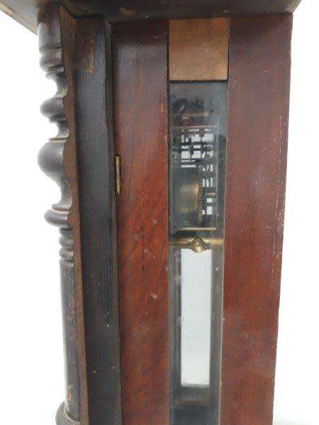 A gorgeous vintage wall hanging clock case with a glass door for restoration