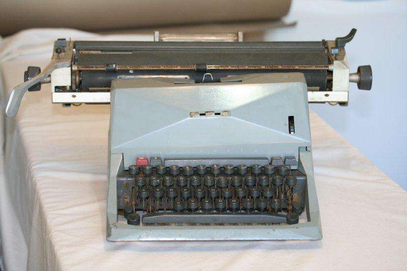 AN ANTIQUE OLIVETTI TYPE WRITER!!!