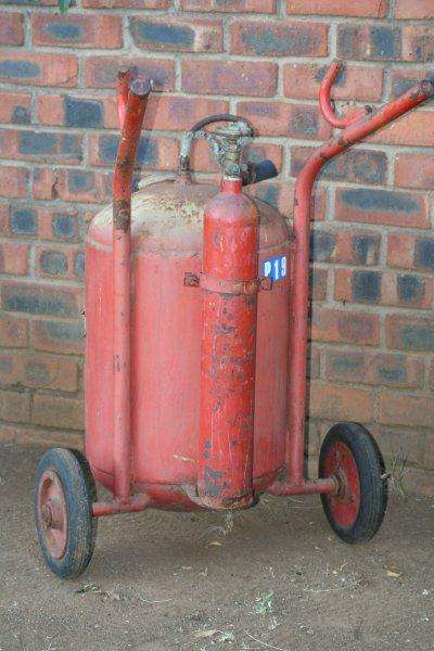 VINTAGE FIRE EXTINGUISHER ON WHEELS..RARE, RARE, RARE - YOU DO NOT FIND THESE!