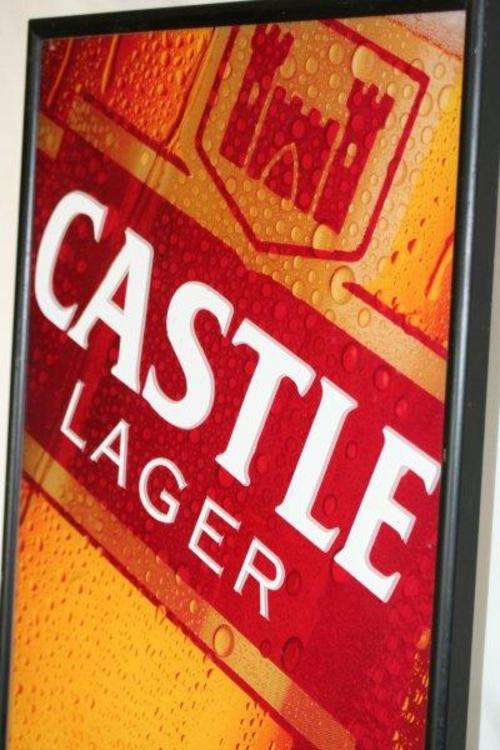 AN AWESOME CASTLE LAGER LIGHT BOX AND IT WORKS PERFECTLY!!! VERY NICE SIGN FOR YOUR BAR...