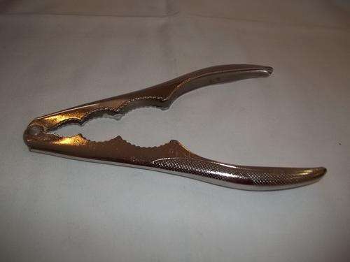 VERY PRACTICAL HAND HELD METAL NUT CRUSHER: GREAT FOR AROUND THE BAR