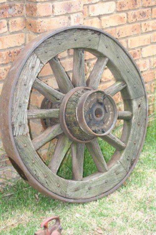 STUNNING AUTHENTIC OX WAGON WHEEL!!! AWESOME PIECE OF HISTORY!!! HIGHLY COLLECTABLE...